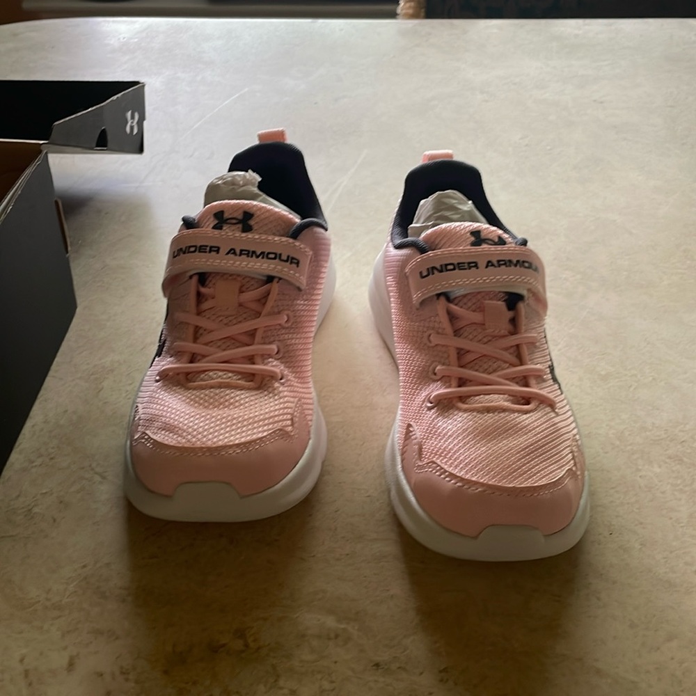 Pink Under Armour tennis shoes